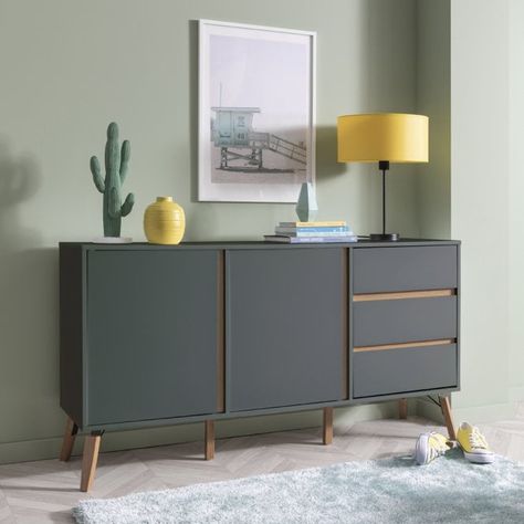 Add a touch of mid-century modern coolness to your lounge space with the Otto Sideboard. Retro legs and natural pine accents add a vintage-inspired edge to the piece, whilst its minimal grey aesthetic brings it slap bang into the millennium. Charming storage space for your living room, Otto features a spacious cupboard and three small drawers. This quirky sideboard promises to look dapper for years to come. Team with matching mid-century style pieces from our Otto living room collection for a Side Cupboard Living Rooms, Small Lounge Decor, Hallway Sideboard Ideas, Modern Lounge Ideas, Sideboards Living Room Inspiration, Next Sideboard, Living Room Cabinet Ideas, How To Style A Sideboard, Lounge 2023