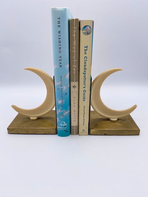 Vintage Pair of Brass and Ivory Crescent Moon Bookends by Walter Von Nessen for Chase & Company Book Ends Aesthetic, Cute Bookends, Clay Bookends, Moon Furniture, Unique Bookends, Vintage Bookends, Moon Decor, Book Ends, Home Library