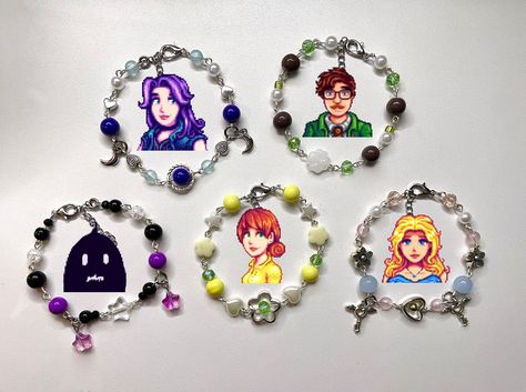 stardew valley bracelets?!?!? just listed on my etsy (only one of each 😱) . . . . . . #jewelry #artist #crafts #smallbusiness #stardewvalley #stardew #bracelets #instadaily #instaart Stardew Valley Bracelet, Stardew Valley Jewelry, Stardew Valley Penny, Valley Game, Beaded Charm Bracelet, Crochet Granny Square Blanket, Jewelry Artist, Stardew Valley, Bead Charm Bracelet