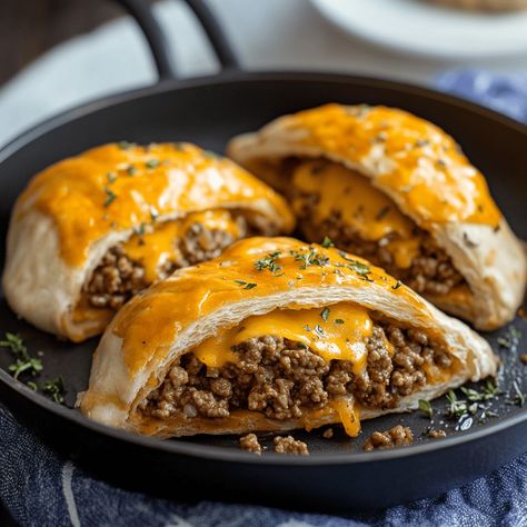 Create these delightful cheeseburger pockets for a fun and tasty twist on a classic cheeseburger. Wrapped in crescent roll dough, they’re perfect for a quick meal or a kid-friendly dinner. Ingredients Instructions Preheat the Oven: Cook the Onions and Beef: Season the Beef Mixture: Assemble the Pockets: Bake: Serve: Enjoy these cheeseburger pockets as a […] Cheeseburger Pockets, Recipe With Crescent Rolls, Hamburger Rolls, Pockets Recipe, Dinner Ingredients, Recipes Main Dishes, Crescent Roll Recipes, Crescent Dough, Crescent Roll Dough