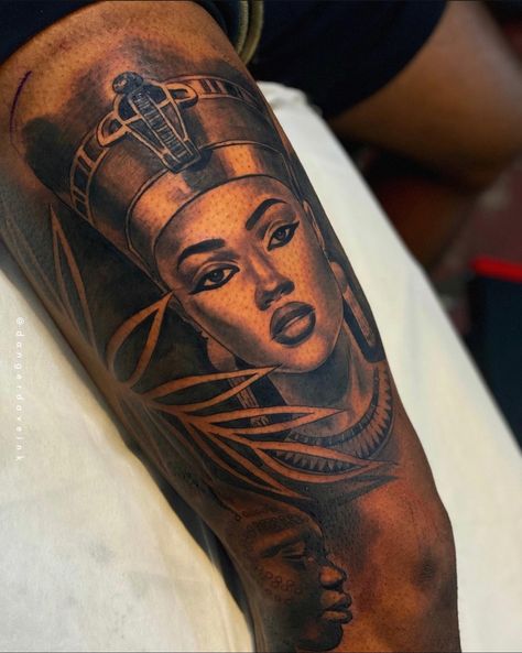 Goddess Tattoos For Women African, African Related Tattoos, Black Queen Tattoo Sleeve, Black Cleopatra Tattoo, Black African Queen Tattoo, Pisces Shoulder Tattoos For Women, My Black Is Beautiful Tattoo, Afrocentric Tattoos For Women Sleeve, Female Egyptian Tattoo