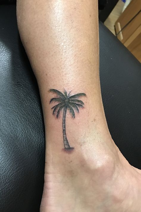 Palm tree tattoo Ankle Tats, Tree Silhouette Tattoo, Tree Tattoo Forearm, Tree Tattoo Men, Bug Tattoo, Palm Tattoos, Tree Tattoo Designs, Palm Tree Tattoo, Skeleton Hand Tattoo