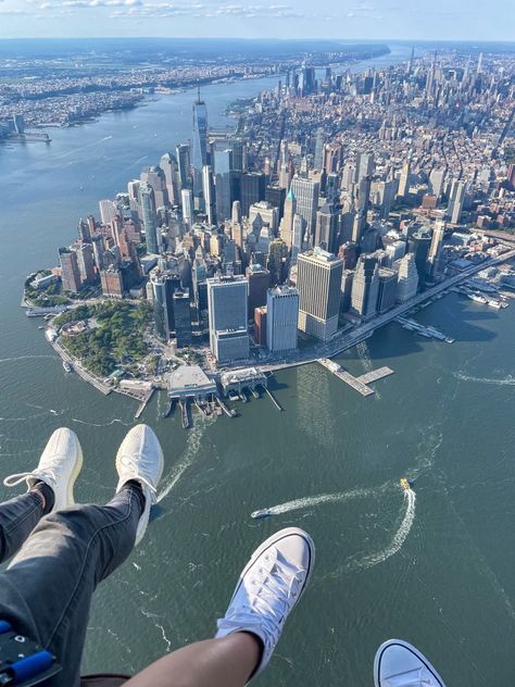 New York City date night. Riding a helicopter with feet dangling out over sky line Helicopter Photography, Nyc Sightseeing, New York Sightseeing, Ny Trip, New York Pictures, Constantly Evolving, Helicopter Ride, Nyc Life, New York Life