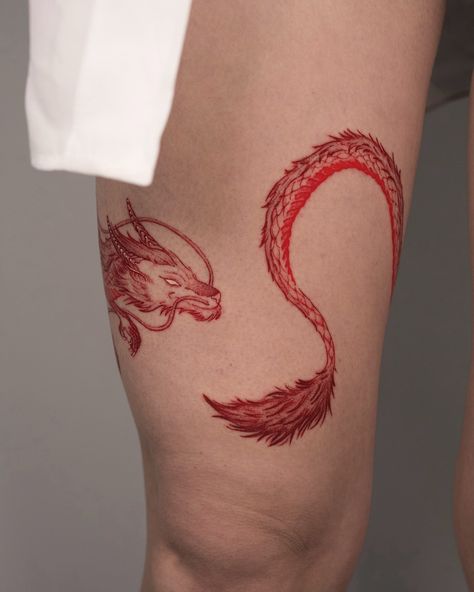 The year of the dragon 🐉✨. This red dragon tattoo wraps around the leg, and I really enjoyed creating this design. The result was amazing! Do you like the shades of red? ❤️ Thank you, Melissa, for your trust. Tattooed at @nobleart. #Tattoo #RedDragon #BodyArt #TattooArtist #InkArt #Color #Creativity #LegTattoo #ColorfulTattoo #TattooArt #PassionForInk #NobleArt Dragon Knee Tattoo, Dragon Calf Tattoo, Dragon Tattoo Thigh, Western Dragon Tattoo, Dragon Tattoo Feminine, Red Dragon Tattoo, Circle Tattoo, Red Tattoo, Dragon Tattoos