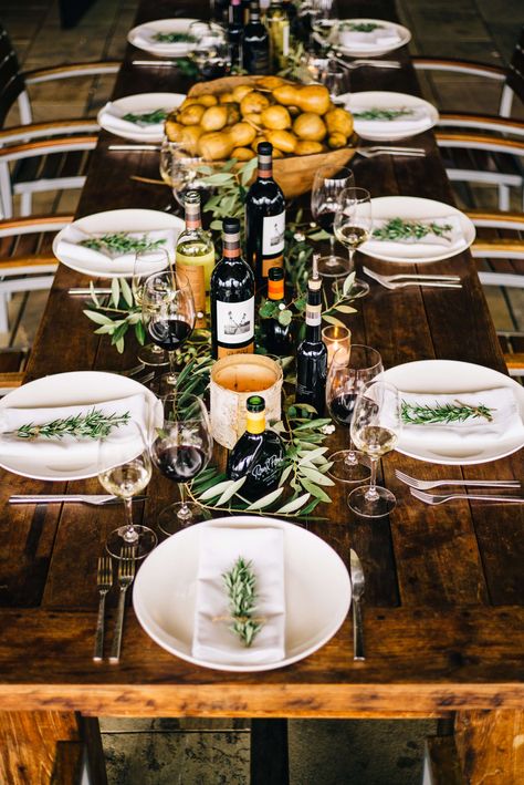 Thanksgiving table set with a big bowl of gourds at round pond estate winery in napa with the taste sf Italian Dinner Table, Thanksgiving Table Set, Italian Dinner Party Decorations, Country Thanksgiving, Italian Thanksgiving, Olive Decor, Dinner Party Table Settings, Family Dinner Table, Italian Dinner Party