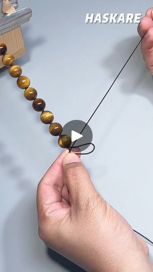 2.4K views · 42 reactions | The quickest way to weave a knot into your bracelet#beaded #diyjewelry #shorts #design #haskare #diyjewelry #knot #diybeads #pfy | Haskare | Sojeso · Attack Shorts Design, Stone Necklace Set, Bracelet Beaded, Diy Beads, Stone Necklace, Necklace Set, Diy Jewelry, Macrame, Knot