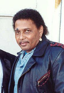 Aaron Neville's first major hit single was  "Tell It Like It Is", which topped Billboard's RB chart for five weeks in 1967 and also reached #2 on the Hot 100. It sold over one million copies, and was awarded a gold disc.[1] A remake of the song was a Top 10 Pop hit for the Rock group Heart featuring Ann and Nancy Wilson in 1981.    In 1989 Neville teamed up with Linda Ronstadt on the album  http://billyfranks.com/AFARCRYFROMSUNSET/archives/1 Everybody Plays The Fool, Aaron Neville, Nancy Wilson, Face The Music, Linda Ronstadt, Good Old Times, Soul Songs, Pop Hits, Rock Groups