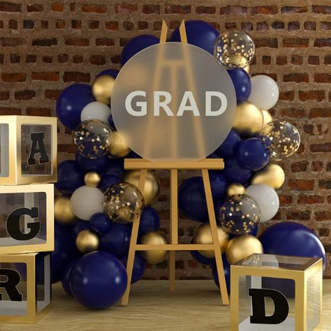 Enhance your special occasion with our Navy Blue, White, and Gold Balloon Garland Arch Kit. These sophisticated balloons will add an elegant touch to your wedding, party, or birthday celebration. Crafted from natural latex, these balloons are biodegradable and create a stunning display when combined with navy blue, white, and gold latex balloons, as well as transparent gold confetti balloons. Balloon Arch Kit includes:1pc 18inch Navy Blue Balloons1pc 18inch White Balloons8pcs 12inch Gold Confett White And Gold Balloon Garland, White And Gold Balloons, Gold Balloon Garland, Gold Graduation Party, Blue Graduation, Grad Party Decorations, Gold Confetti Balloons, Gold Birthday Party, Garland Arch