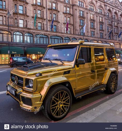 Download this stock image: Luxury car in gold paint, Mercedes Benz W463, G-Class, Brabus G850 6.0 Widestar, parked in front of Harrods department store - RA46MM from Alamy's library of millions of high resolution stock photos, illustrations and vectors. Luxury Jeep, Garage Luxury, Gold Cars, Lowrider Show, Car Side View, R34 Gtr, Gold Car, Tokyo Drift, Mercedes G Wagon