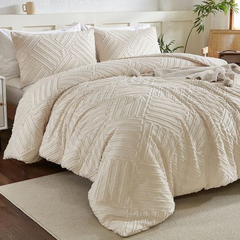 PRICES MAY VARY. 【Boho Tufted Design】DJY beige comforter set features simple yet elegant embroidered tufts, delicate geometric patterns add texture to its appearance. The chic style and solid hue easily coordinates and blends with the room's décor, creating a modern and stylish environment to your bedroom. 【PREMIUM MATERIAL:】DJY boho comforter features a double-sided design. The front has tufting elements embroidered on it, while the back is made of soft, durable microfiber. The cloud-like down Conforter Bedrooms Ideas, Off White Comforter Bedroom, Calming Bedding, Cream Colored Bedding Comforter, Cream Bed Comforter, Trendy Bedding Comforter Sets, Beige Bed Decor, Boho Bedding Comforters, Cream Comforter Bedding