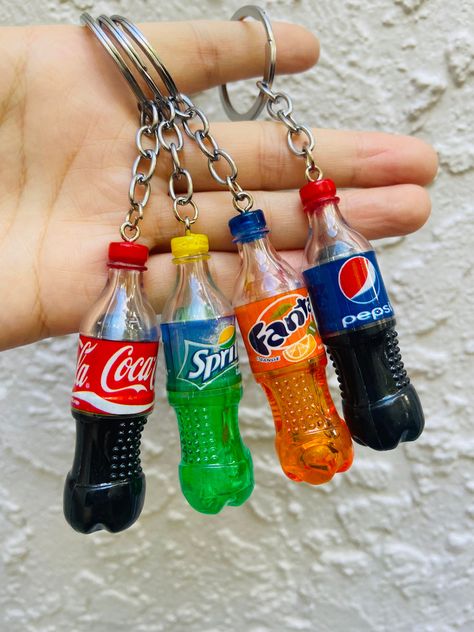 Super cute large soda bottle resin keychain! Personalize it with a silver tone letter charm! Great for stocking stuffer, party favors, birthday gifts etc.  .choose your flavor .provide one letter Initial in personalization box if you would like to add it to the keychain.  content is solid resin, not moving Mini Party Favors, Useful Stocking Stuffers, Cool Keychain, Keychains Cute, Gift Letter, Cute Keychains, Keychain Making, Cool Keychains, Cute School Stationary