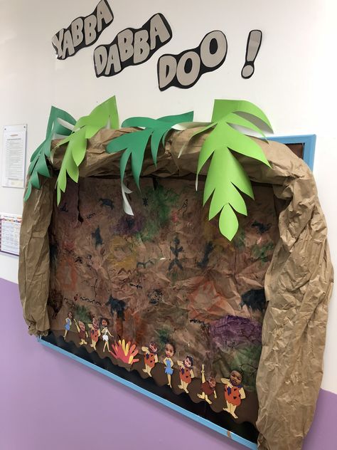 My Stone Age Board (Flinstones Themed) #TheLearningExperience #TLERoseland #Stoneage #flinstones Prehistoric Classroom Theme, Stone Age Projects For Kids, Flinstones Decorations, Stone Age Display, Stone Age Houses, Decoration Class, Arte Quilling, Ra Ideas, School Displays