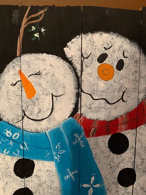 Excited to share this item from my #etsy shop: Wood palette mistletoe snowmen  couple with black background Snowmen Paintings On Wood, Snow Man Painting On Wood, Painted Snowman Family On Wood, Family Of Snowmen Painting, Snowman On Pallet Wood, Diy Schneemann, Snowman Faces, Under The Mistletoe, Snowman Painting