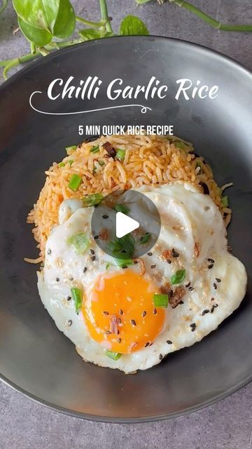 Preetha Athrey on Instagram: "CHILLI FRIED RICE - 5 min LUNCH

Celebrate the simplicity of flavours with this quick and easy Chilli Garlic Rice topped with a perfectly fried egg. 

Bursting with the robust combination of garlic and red chilli, this dish promises to be a delightful treat for your taste buds. With just a handful of ingredients, this recipe not only offers convenience but also packs a punch of deliciousness. 

Whether you’re pressed for time or seeking a fuss-free meal, this Chilli Garlic Rice with a fried egg on top is sure to satisfy your cravings.

So do give this a try and home and follow my channel for more such easy-to-make delicious recipes and like, share and comment 😍

[recipe, rice, recipes, Indian food, fusion food, quick meals, lunch, dinner, brunch, comfort food Fried Rice Recipe Indian, Quick Rice Recipes, Easy Chilli, Quick Rice, Homemade Chilli, Indian Rice Recipes, Garlic Rice, Red Chilli Powder, Cooked Rice