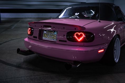 Mazda Mx5 Miata Pink, Miata Aesthetic Night, Hello Kitty Miata, Purple Mazda Miata, Pink Miata Aesthetic, Miata Interior Mods, Mx5 Aesthetic, Miata Car Aesthetic, Pink Miata Mx5