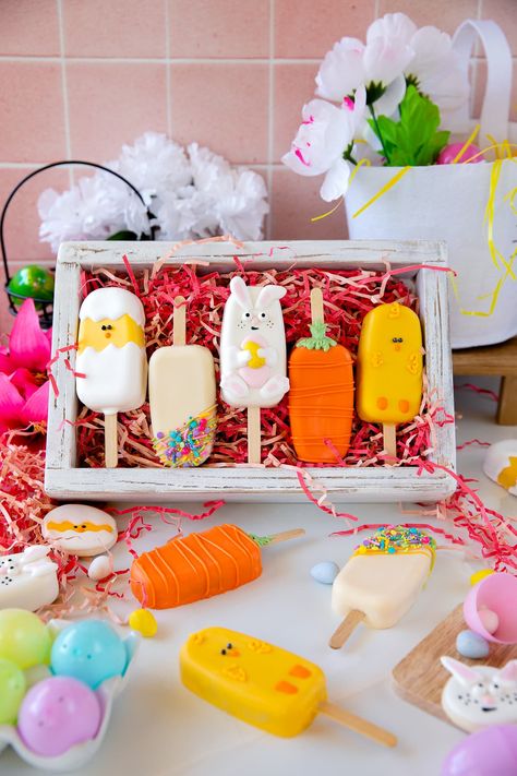 easter cakesicles in box Easter Popsicles, Easter Cakesicles Ideas, Easter Cake Popsicles, Bunny Cakesicles, Easter Cakecicle, Easter Sweets Ideas To Sell, Easter Cakesicles, Farm Cakesicles, Easter Treats To Sell