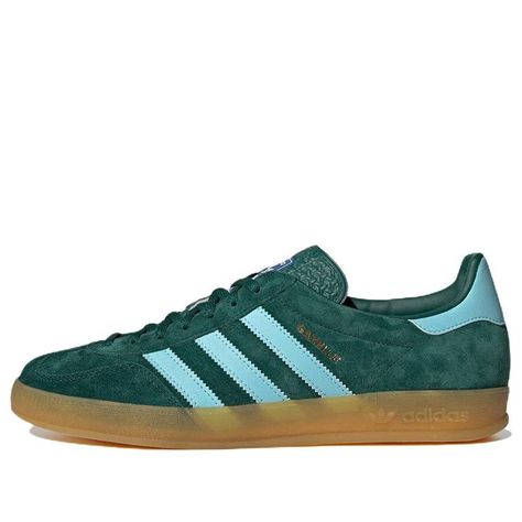 The adidas Gazelle 'Collegiate Green Hazy Sky' is a stylish and modern sneaker that is perfect for everyday wear. Its silhouette is inspired by the classic Gazelle series and features a collegiate green upper with a hazy sky sole. The sole is made of durable material that provides comfort and support for all-day wear. Whether you're running errands or heading to the office, the Gazelle 'Collegiate Green Hazy Sky' is the perfect choice for a fashionable and comfortable look. (SNKR/Skate/Light/Uni Nite Jogger, Mesh Heels, Look Retro, Green Sneakers, Adidas Originals Mens, Breathable Shoes, Spring Sale, Adidas Gazelle, Blue Adidas