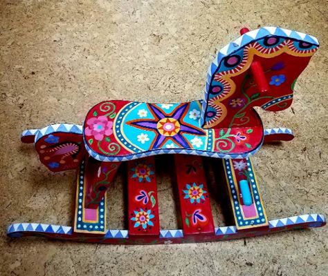 Painted Rocking Horse Ideas, Painted Rocking Horse, Rocking Horses Painted, Rocking Horse Diy, Flower And Geometric, Swedish Dala Horse, Dresser Refinish, Fireplace Art, Wooden Rocking Horse