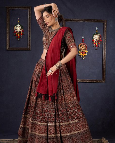 Indulge in the luxurious and exclusive world of fashion with our Elegant Maroon & Black Ajrakh Lehenga. Adorned with intricate Ajrakh print, this stunning lehenga comes with a matching blouse and dupatta, creating a timeless and elegant ensemble. Embrace sophistication and elevate your style with this beautiful piece. #sujatra #sujatraglobal #sujatralehenga #readymadelehenga #stitchedlehengacholi #lehengacholi #ajrakhprints #ajrakhlehenga #lehengalove Ajrakh Lehenga, Ajrakh Prints, Lehenga Choli, World Of Fashion, Lehenga, Return Policy, Wedding Decorations, Size Chart, Black