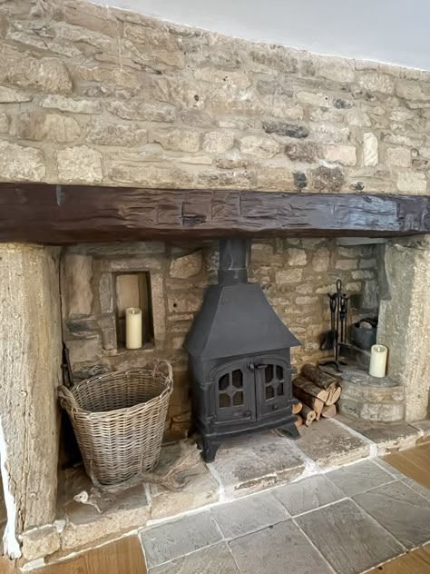 Fireplace With Wood Stove Inside, Stone Hearth Wood Stove, Old Cottage Fireplace, Woodstove Hearths Stone, Stone Wall Behind Wood Stove, Wood Stove Stone Wall, Woodstove Surrounds Stone, Small Stone Fireplace, Wood Stove Corner Ideas