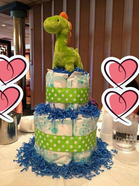 Alternative to a diaper cake - a baby wipes cake! Wipe Cake Shower Gifts, Diaper Cake Alternative, Dino Diaper Cake, Baby Wipes Gift Ideas, Dinosaur Diaper Cake, Dino Room, Diaper Cake Centerpieces, Dino Cake, Baby Wreath