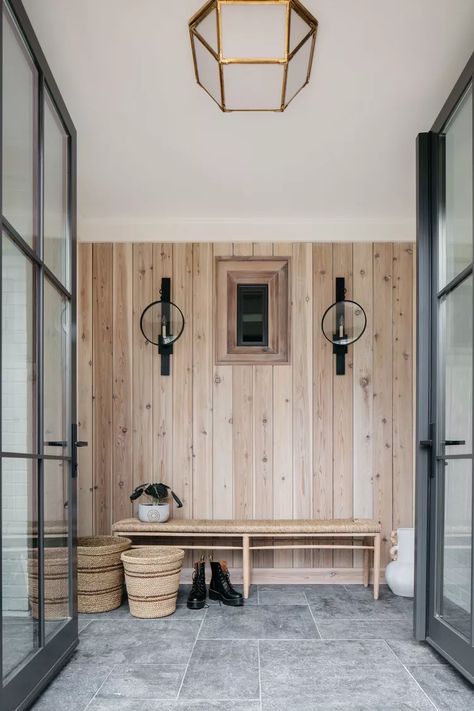 28 Inviting Entryway Bench Ideas to Welcome Guests Paneling Laundry Room, Entryway Bench Ideas, Modern English Country, Mudroom Flooring, Kate Marker Interiors, Stone Tile Flooring, Herringbone Wood Floor, Mudroom Ideas, Mud Room Storage