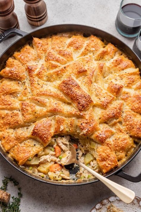 Slice removed from golden brown chicken pot pie in puff pastry. Pot Pie With Puff Pastry, Pie With Puff Pastry, Puff Pastry Chicken, Carrots And Celery, Savoury Pies, Puff Pastry Crust, Homemade Chicken Pot Pie, Rosemary And Thyme, Easy Chicken Pot Pie