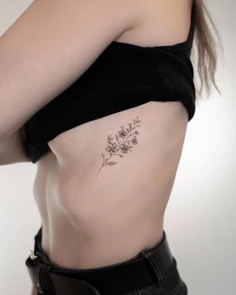 Flower Rub Tattoos, Small Rib Flower Tattoo, Plumbago Tattoo, Nature Rib Tattoo, Flower On Ribs Tattoo, Delicate Flower Tattoo Ribs, Wildflower Rib Tattoo, Flower With Writing Tattoo, Wildflower Tattoo Ribs