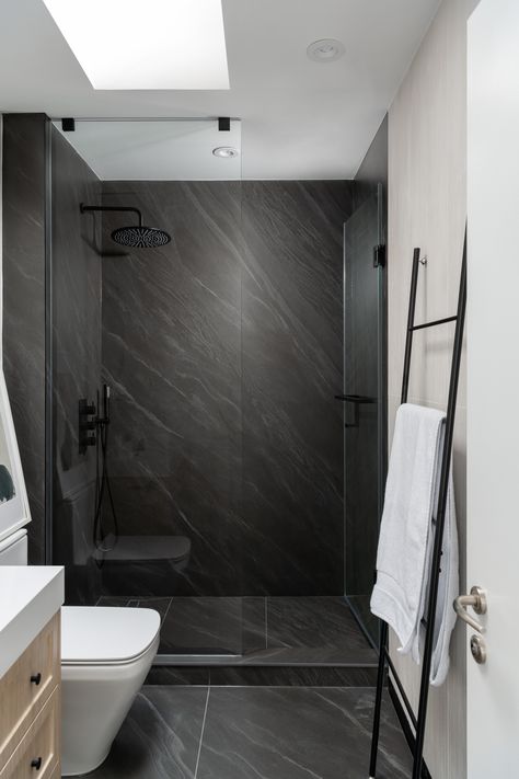 Dive into timeless elegance with this sleek black bathroom design. Where monochrome themes meet contemporary sophistication, creating a bathroom oasis that's both chic and serene. Designed by Dexign Matter Studio White Tile Bathroom Floor, Contemporary Washroom, Black Bathroom Design, Living Room Rug Placement, Black And White Tiles Bathroom, Bathroom Design Black, Rug Placement, Bathroom Oasis, Bathroom Design Inspiration