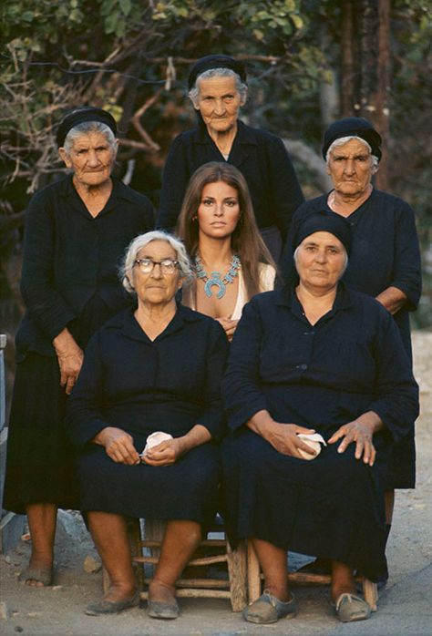 American actress Raquel Welch with a group of old women on the set of the film ‘The Beloved (aka Sin and Restless)’ written and directed by George P. Cosmatos, in Cyprus 1970. Rachel Welch, Terry O Neill, Raquel Welch, Vintage Film, Celebrity Art, Cyprus, A Group, On Set, American Actress