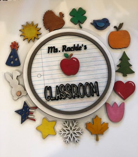 Enhance your classroom decor with an Interchangeable Classroom Sign that adds personality and warmth to any space. Perfect for staff appreciation gifts or DIY projects, these signs can be customized for various occasions throughout the year. Explore creative ideas like school wreaths and wooden door hangers that make welcoming environments for students and teachers alike. Celebrate education with decor that inspires learning and community spirit in every classroom! School Wreaths, Interchangeable Sign, Woman Costumes, Staff Appreciation Gifts, Chalk Crafts, Classroom Birthday, Door Signs Diy, Teachers Diy, Classroom Signs