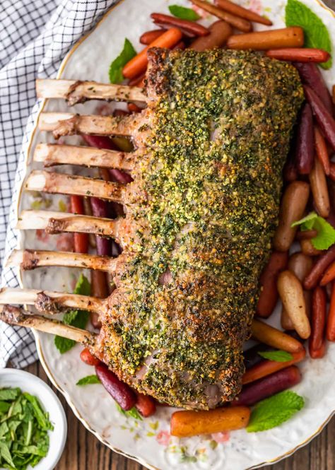 herb crusted rack of lamb on a palte with roasted carrots Mint Jelly Recipe, Lamb Rack Recipe, Lamb Casserole, Roast Rack Of Lamb, Easy Easter Recipes, Herb Rack, Crusted Rack Of Lamb, Easter Meal, Lamb Dinner