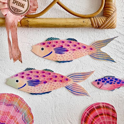 Fish! 🐠🐟🐠 I’m dreaming up some new bits and pieces to make out of wood…Are there any themes or objects that would pique your interest aside from the fish and shells I already have? I’d love to know! ✨ #fishart #cornwallartist #nauticalart #marineanimals #fishlover #woodenfish #oceanlife #inspiredbynature_ Fish Decorations, Magical Ocean, Wooden Fish, Beach Theme Decor, Fish Wall Art, All Fish, Ocean Decor, Fishing Decor, Birch Ply