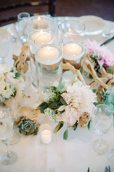 Table Centerpieces (1 per table). Driftwood wreath with succulents, eucalyptus, snow on mountain and Dahlias. Wedding Centerpieces Floating Candles, Purple Succulent Wedding, Centerpieces Floating Candles, Driftwood Wedding Centerpieces, Coastal Wedding Centerpieces, Driftwood Wedding, Floating Candle Centerpieces Wedding, Succulent Wedding Centerpieces, Driftwood Centerpiece