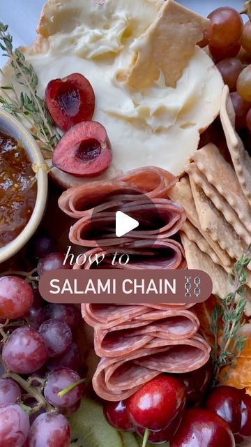 Nicolle | Cheese, Wine, Easy Appetizers & Recipes on Instagram: "Salami Chain ⛓  If you need a different way to style your salami for a charcuterie board or appetizer, here it is! 🧀☺️  Super easy way to make your salami slices look elevated on a board!   SAVE for your next charcuterie board ✅  • • • #huffposttaste #tastingtable #foodie #foodstyling #eeeeeats #gofinding #cheeseboard #wineandcheese #feedfeed #todayfood #foodandwine #TOHfoodie #tastemademedoit #eastcoastfoodies #winelover #thekitchn #foodandwine #foodart #salami" How To Fold Ham Charcuterie, Salami Chain, Chacuterie Board, Cheese And Charcuterie Board, Cheese Wine, Antipasto Platter, Chicken Appetizers, A Charcuterie Board, Easy Appetizers