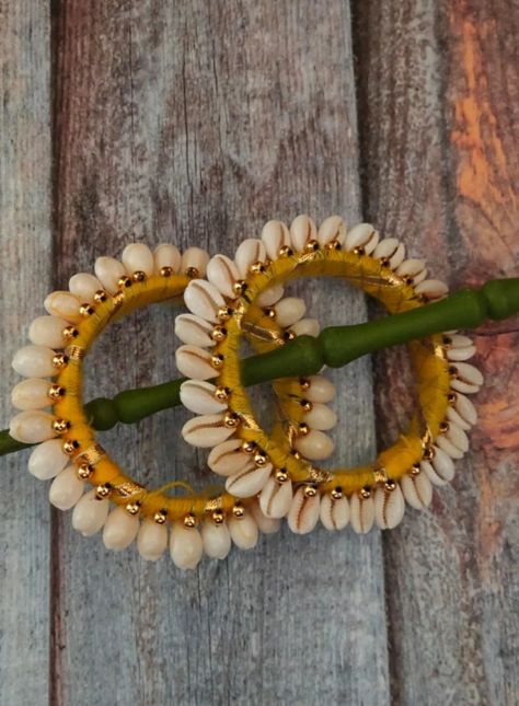 R.k fashions Navratri Accessories, Diy Bangles, Shell Bangles, Haldi Jewellery, Cloth Jewellery, Flower Jewellery For Mehndi, Bangle Ceremony, Fabric Bangles, Cowrie Shell Jewelry