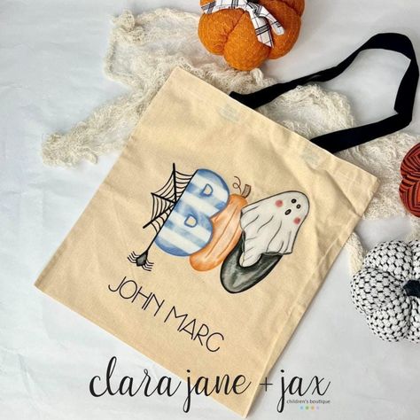 Personalized Halloween bags are ready for preordering and they're spook-tacularly cute! 👻👻👻 Details: *Must preorder by Oct 9 *Should be ready for pickup/shipping the week of Oct 21 *Bag measures about 15 wide X 16 high *Six styles to choose from *💲24 99 *Order at the link in our bio *Double-check spelling of name(s) *Be sure to select font *Personalized items are non-returnable #Halloween #trickortreat #clarajaneandjax Halloween Trick Or Treat Bags, Personalized Halloween Bags, Personalized Hangers, Spooky Treats, Kids Cups, Halloween Bags, Trick Or Treat Bags, Burp Cloth Set, Baby Name Signs