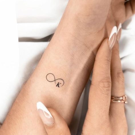 Aesthetic Tattoos For Couple, Kk Tattoo Ideas, J C Tattoo, Infinity Tattoo With Letter, Tattoo K Letter, K Letter Tattoo, Letter K Tattoo, Small Infinity Tattoos, Letter S Tattoo