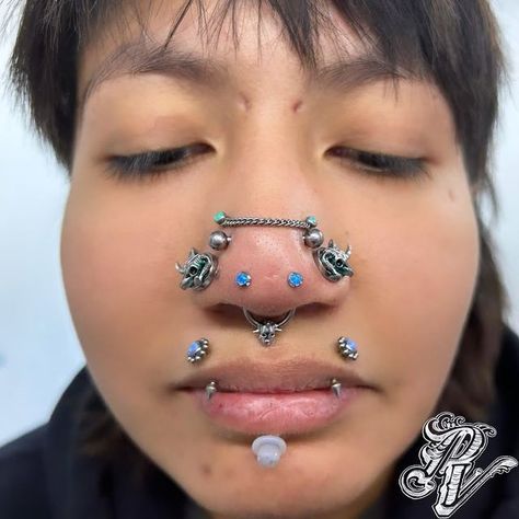 ☊ Piercing Vegas ☊ on Instagram: "@krkpiercing did some Mantis Piercings on one of our favorite clients. She also did the large gauge nostrils! Featuring Angel bites and high nostrils by @piercingwithscott ! We love this setup! Decked out with some gorgeous blue opal ends from @invictus_bodyjewelry !" Piercing Setup, Philtrum Piercing Jewelry, Mantis Nose Piercing, Mantis Piercing, Nose Bridge Piercing Jewelry, Nose Spike Piercing, Medusa Piercing Jewelry Philtrum, Angel Bites Piercing, Angel Bites