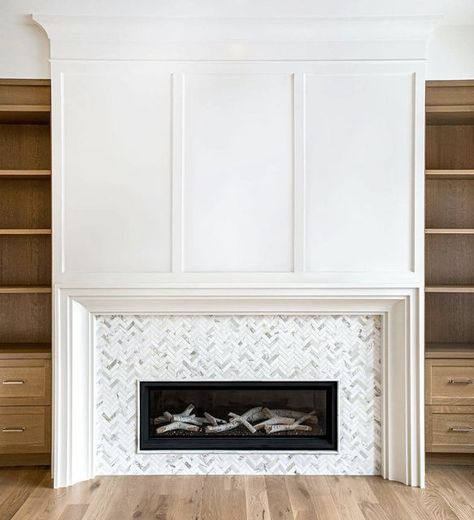 Melissa Manzardo Hryszko on Instagram: "This five-piece mitred fireplace surround perfectly frames the linear firebox for the living room at Lakeview Village {custom 2}. . . . . . . . . 📷: @_lnphoto #fireplace #fireplacedesign #livingroom #livingroomdesign #livingroominspo #fireplacemantel #marbletiles #linearfireplace #custommillwork #customcabinetry #familyroom #greatroom #livingroomideas #yychomes #calgaryhomes #yycrealestate #calgaryrealestate #yycbuilder #lakeviewvillagecustom2" Exposed Brick Fireplaces, Fireplace Frame, Fireplace Tile Surround, Linear Fireplace, Hearth Room, Calacatta Marble, Fireplace Surround, Modern Fireplace, Fireplace Tile