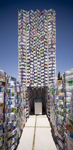 A structure made of recycled material on the occasion of International Recycling Day Recycle Design, Unusual Buildings, Granada Spain, Green Architecture, Recycled Projects, Milk Carton, Eco Design, Public Art, Space Design