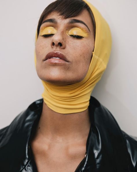 Yellow glossy lids, aka "egg yolk eyes," are the weird beauty trend makeup artists can't stop 'gramming. See what we're talking about. Yellow Editorial, Yellow Eyeshadow Aesthetic, Graphic Eyeliner Yellow, Gold Makeup Looks Editorial, Red Eye Makeup Editorial, Weird Beauty, Trend Makeup, Yellow Editorial Makeup, Glossy Lids