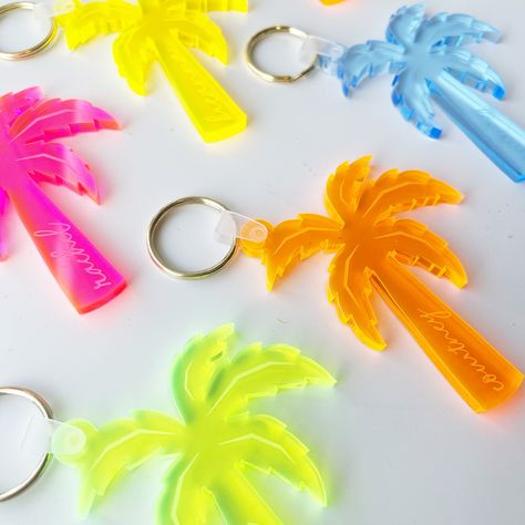 "Headed to a beach bachelorette? Throwing a tropical party? Looking for something special to personalize your gifts? Snag these personalized palm tree keychains as the perfect addition to your party or bachelorette gifts.  It's a great way to personalize your bags, add a little something to a gift, or keep it for yourself! || THE DETAILS || -Size: size is APPROXIMATELY 2in wide x 2.5in tall. Size will vary with different letters -1/4 inch thick durable neon/fluorescent acrylic || HOW TO ORDER || or refer to the \"How to Order\" photo in listing 1. choose your quantity from the drop down menu with a red asterisk 2. choose whether you want just a palm tree or palm tree with names - In the personalization section - 3. Enter name if you purchased palm tree with name **all names will be lowerca Palm Tree Bachelorette Party, Palm Springs Bachelorette Gift Bags, Tropical Bridesmaid Proposal, Bachelorette Gift Bags Beach, Bach Gift Bags, Luau Bachelorette Party, Hawaii Bachelorette Party, Key West Bachelorette Party, Tropical Party Favors