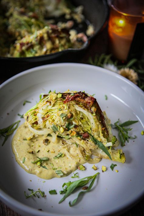 Elevate your winter dining experience with Cozy Roasted Cabbage Steaks, featuring a luscious pistachio cream sauce and bites of crispy prosciutto. A perfect blend of warmth and sophistication, this recipe is crafted to nourish both the body and soul during the chilly months. Cabbage Steak, Cabbage Steaks Recipe, Roasted Cabbage Steaks, Crispy Prosciutto, Cabbage Steaks, Starch Solution, Cream Sauce Recipes, Roasted Cabbage, Pistachio Cream