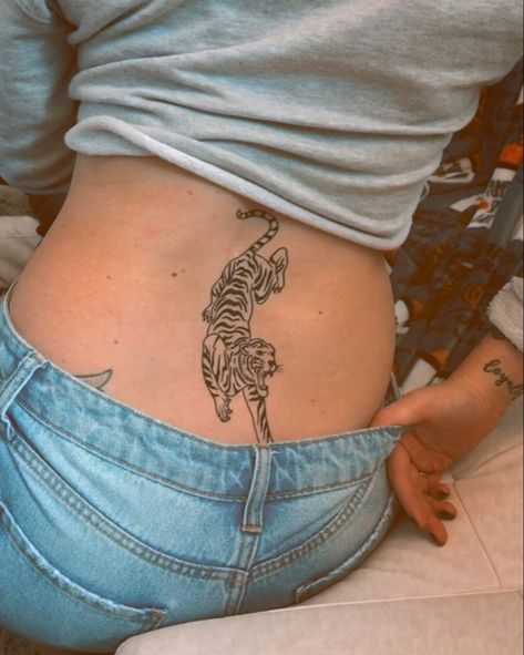 Tramp Stamp, Lower back tattoo, tiger tattoo Tiger Lower Back Tattoo Women, Lower Back Tiger Tattoo, Old School Tramp Stamp, Trendy Tramp Stamp, Tiger Tramp Stamp, Tramp Stamps Lower Backs, Cute Lower Back Tattoos, Tasteful Tramp Stamp, Lower Spine Tattoo