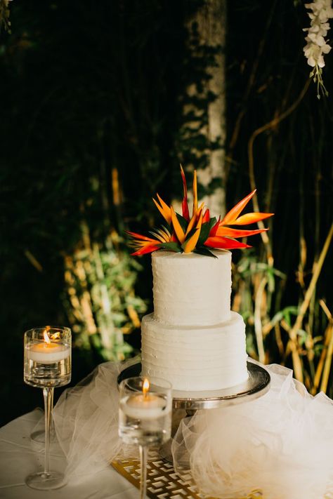 Juliandra + Kevin's Jamacia destination wedding at Hotel Rui Jamacia. tropical wedding tablescape I destination wedding jamacia I tropical wedding centerpieces I beach wedding venues jamaica I jamaica destination wedding decor I tropical wedding flowers I destination wedding photographer I tropical wedding cake I bird of paradise wedding cake topper Bird Of Paradise Wedding Cake, Jamaica Wedding Flowers, Tropical Flower Wedding Cake, Tiki Theme Wedding, Birds Of Paradise Wedding Cake, Tropical Romantic Wedding, Classy Tropical Wedding, Jungle Wedding Cake, Simple Tropical Wedding