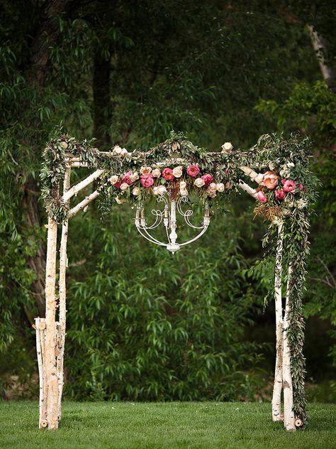 Capture enchanting wedding photos against an outdoor birchwood arbor and overhanging rustic chandelier. Wedding Arches Outdoors, Wedding Arbors, Wedding Arch Rustic, Wedding Arbour, Wedding Altars, Dream Destination Wedding, Rustic Chandelier, Ideal Wedding, Wedding Event Planning