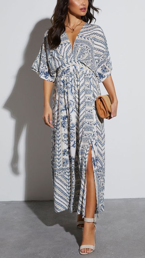 Step out in style with this blue floral print kimono maxi dress, featuring a flattering fitted waist, breezy kimono sleeves, and a chic front slit. The contrasting floral and stripe patterns add a fresh, elegant vibe to your look. Kimono Wrap Dress, Kimono Maxi Dress, Floral Print Kimono, Kimono Sleeves, Print Kimonos, Blue Floral Print, Kimono Sleeve, Swimwear Cover, Hoodie Top