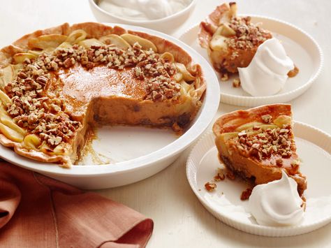 Food Network's Apple-Pumpkin-Pecan Pie - This is the ultimate holiday pie for those who love apple, pumpkin and pecan pie equally. There's no need to choose-our creation boasts a gooey pecan bottom, a sweet-and-tart apple edge and a creamy pumpkin center. Make it the day before and refrigerate overnight; serve at room temperature or chilled. #Thanksgiving #ThanksgivingFeast #Dessert Pumpkin Apple Pecan Pie, Pumpkin Cream Pie Pioneer Woman, Americas Test Kitchen Pumpkin Pie, Pumpkin Pecan Pie Recipe, Pioneer Woman Dreamy Apple Pie, Food Network Pecan Pie, Holiday Pie, Pecan Pumpkin, Fun Thanksgiving Desserts