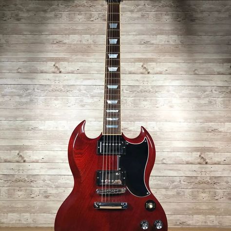 For sale: Gibson SG Standard 100 Year Model 2015 Used Beautiful 2015 SG Standard! Transparent cherry red with ornate grain and trapezoid inlay. Classic ’57 humbuckers, tune-matic bridge and original robotic tuning system! Buy now: Link in Bio #gibsonguitars #gibsonsg Gibson Sg Standard, Gibson Sg, Gibson Guitars, Cherry Red, Gibson, Buy Now, Link In Bio, Grain, Bridge